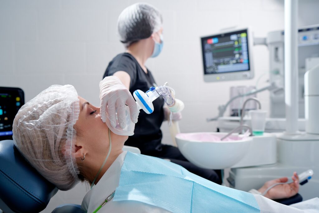 anxious patient undergoing sedation before a procedure