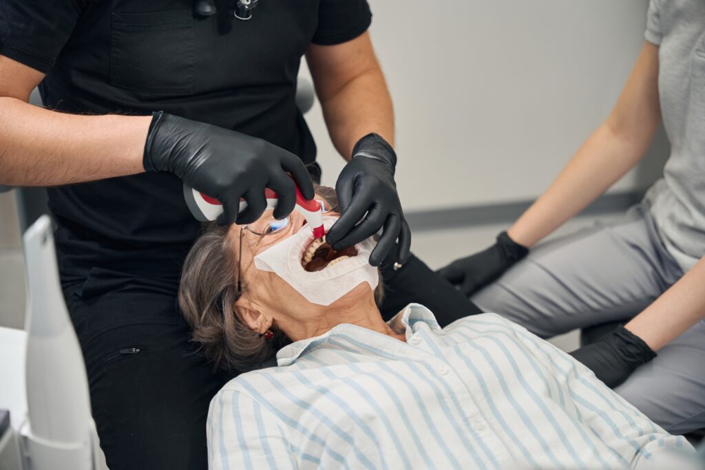Dentist restores an elderly ladys teeth